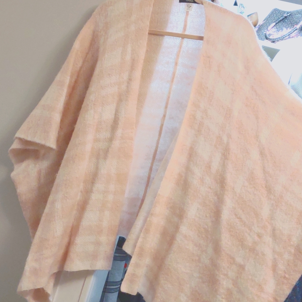 Pink and white poncho